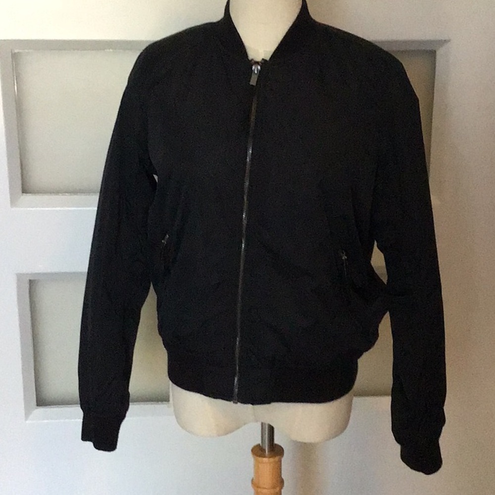 Black bomber jacket.